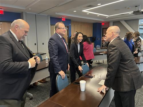  UAH president with area school superintendents